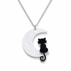 Cat Moon Necklace with black cat on pearlescent white crescent moon pendant and silver-tone chain