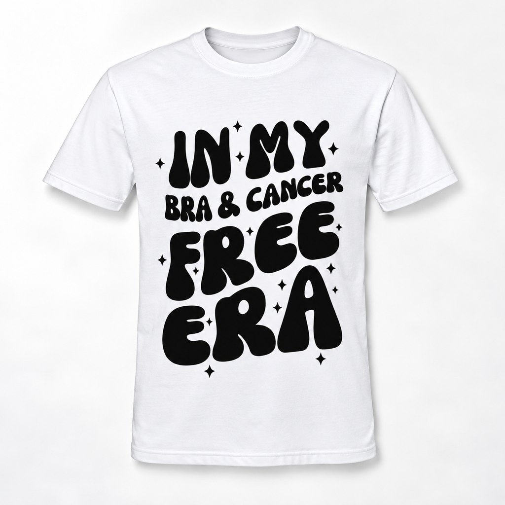 A white short-sleeve crewneck t-shirt with a bold black graphic text reading 'IN MY BRA & CANCER FREE ERA' decorated with small black star accents, displayed on a clean white background.