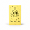 The Classic Tarot deck box in pale yellow with a black celestial design of a crescent moon, sun, and stars, on a white background.