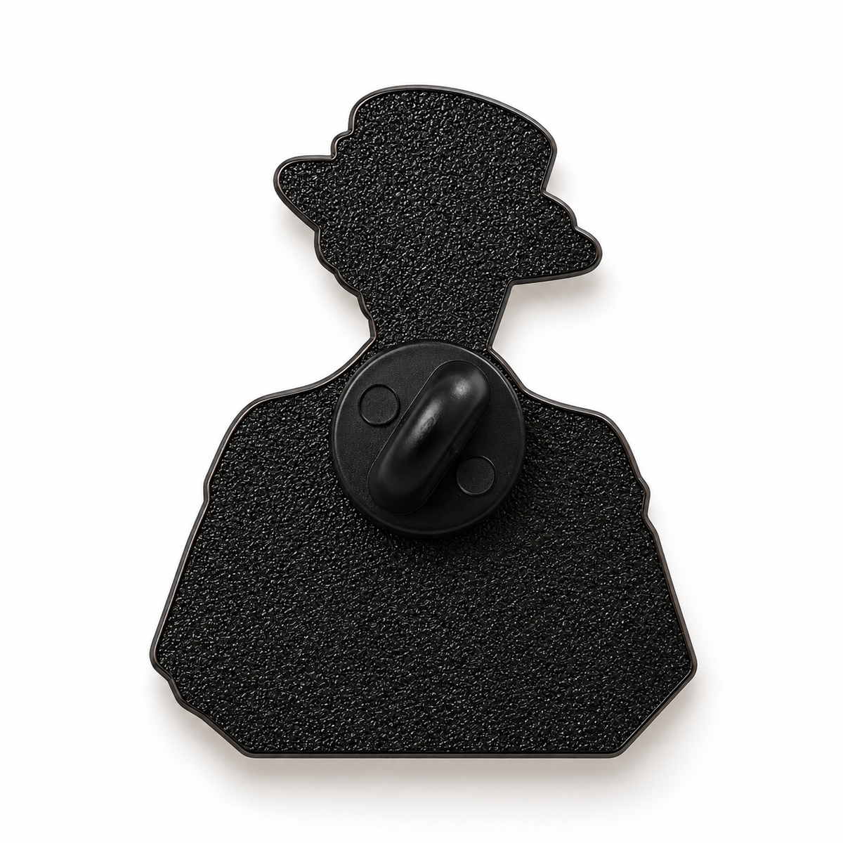 The back of a novelty pin shaped like a silhouette of a person wearing a top hat, with a central circular clasp, shown on a plain white background.