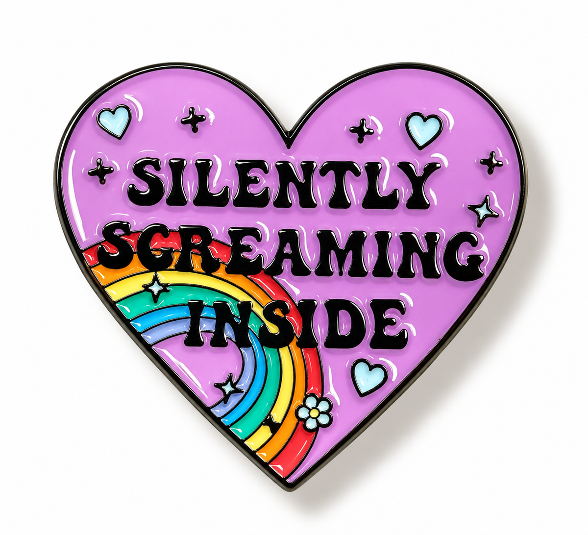 A heart-shaped enamel pin with a light purple background, black border, and the text 'SILENTLY SCREAMING INSIDE' in black. A rainbow arc and small hearts, stars, and flowers decorate the design.