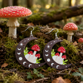 Wooden Mushroom Moon Earrings in a Forest of Mushrooms